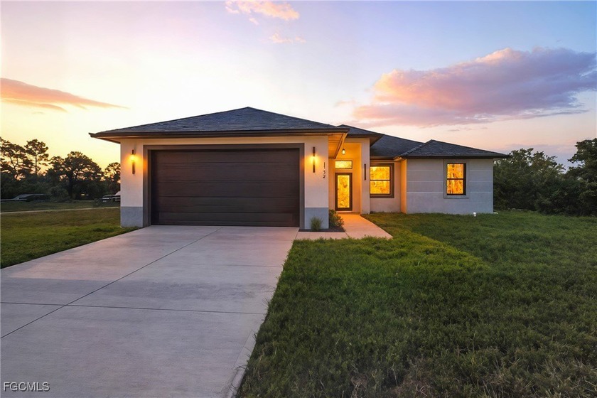 Stunning New Construction in Lehigh Acres! Discover modern - Beach Home for sale in Lehigh Acres, Florida on Beachhouse.com