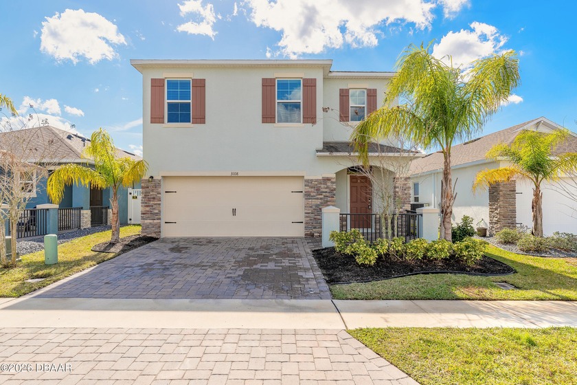Discover this bright and spacious 5-bedroom, 3-bath home in The - Beach Home for sale in New Smyrna Beach, Florida on Beachhouse.com