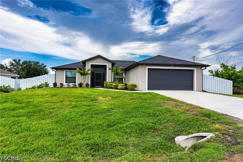 Welcome to 1028 Champion Ave, a beautifully maintained 2023 home - Beach Home for sale in Lehigh Acres, Florida on Beachhouse.com