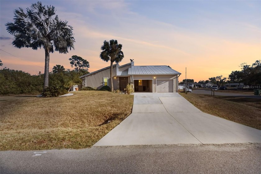 Dynamically different and designed for true Florida living, this - Beach Home for sale in Port Charlotte, Florida on Beachhouse.com