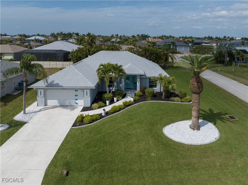 *STUNNING* Modern Home with Tropical View and Heated Pool* Live - Beach Home for sale in Cape Coral, Florida on Beachhouse.com