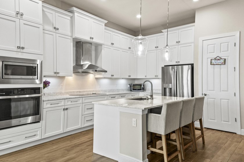 Step into this stunning 3 bedroom, 3 bath lakefront home with a - Beach Home for sale in Port Saint Lucie, Florida on Beachhouse.com