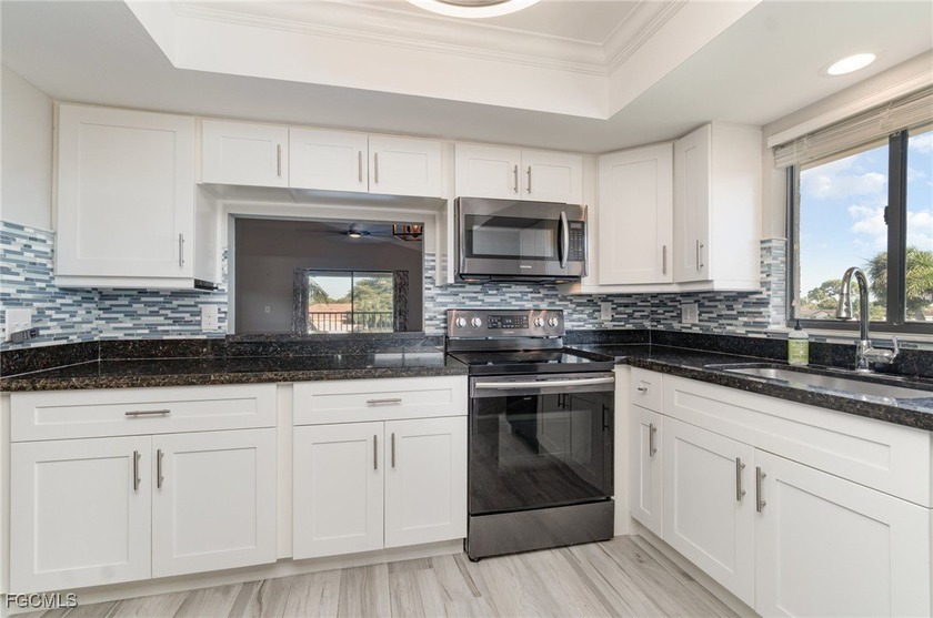 Experience the ultimate SW Florida Gulf-access lifestyle in this - Beach Condo for sale in Cape Coral, Florida on Beachhouse.com