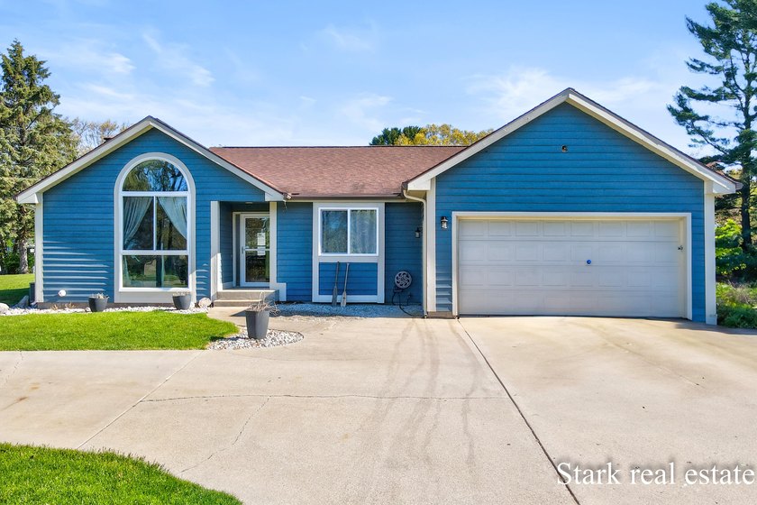 Fantastic location for this remodeled Reeths Puffer ranch with - Beach Home for sale in Muskegon, Michigan on Beachhouse.com
