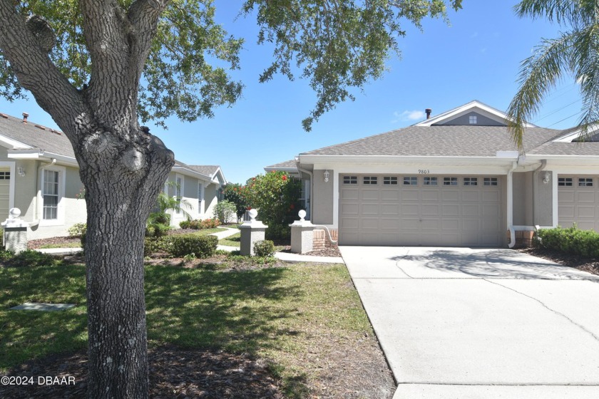 Welcome to this well-maintained waterfront villa nestled on a - Beach Home for sale in Tampa, Florida on Beachhouse.com