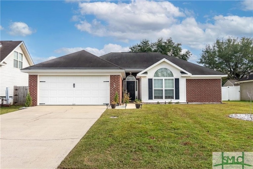 Discover the charm of this beautifully updated brick ranch with - Beach Home for sale in Savannah, Georgia on Beachhouse.com