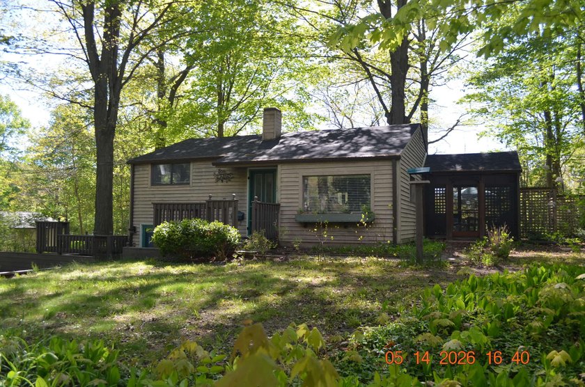 Charming 2BR/1BA Wooded Cottage Retreat Near Lake Michigan - Beach Home for sale in Coloma, Michigan on Beachhouse.com