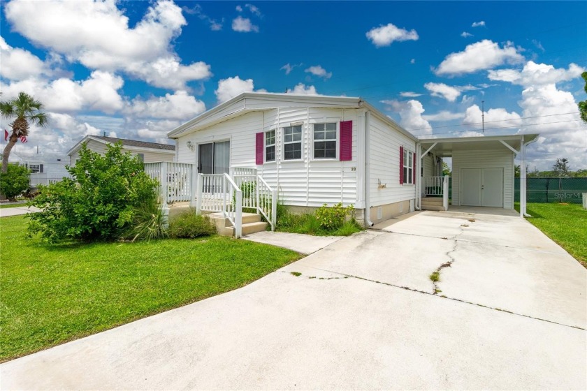 This cute and charming 2 bedroom, 2 bath manufactured home is - Beach Home for sale in Punta Gorda, Florida on Beachhouse.com