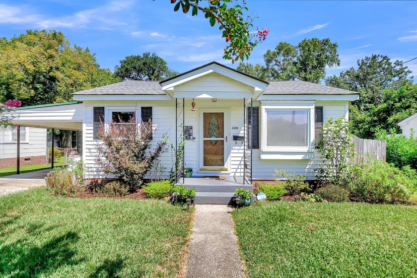 This charming ranch home is nestled on a large lot in Park - Beach Home for sale in North Charleston, South Carolina on Beachhouse.com