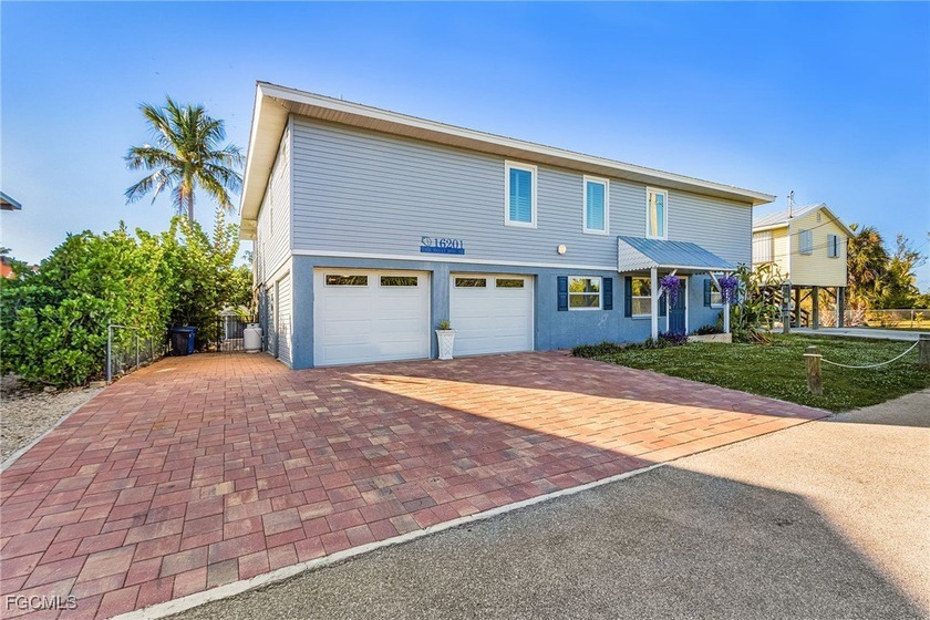 Nestled on one of Pine Island's premier waterfront streets, this - Beach Home for sale in Bokeelia, Florida on Beachhouse.com