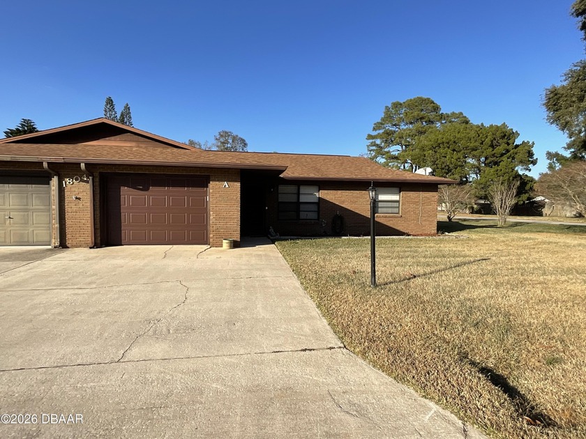 Check out this two bedroom, two bath brick home in New Smyrna - Beach Home for sale in New Smyrna Beach, Florida on Beachhouse.com