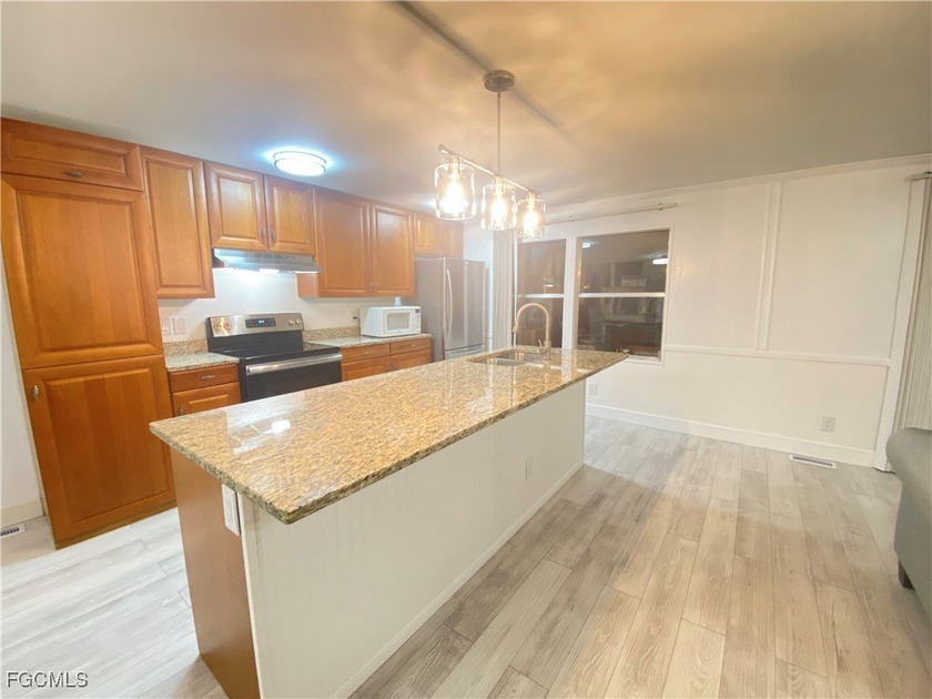 Affordable Gulf-Access Home in Old Bridge Village (55+ Gated - Beach Home for sale in North Fort Myers, Florida on Beachhouse.com