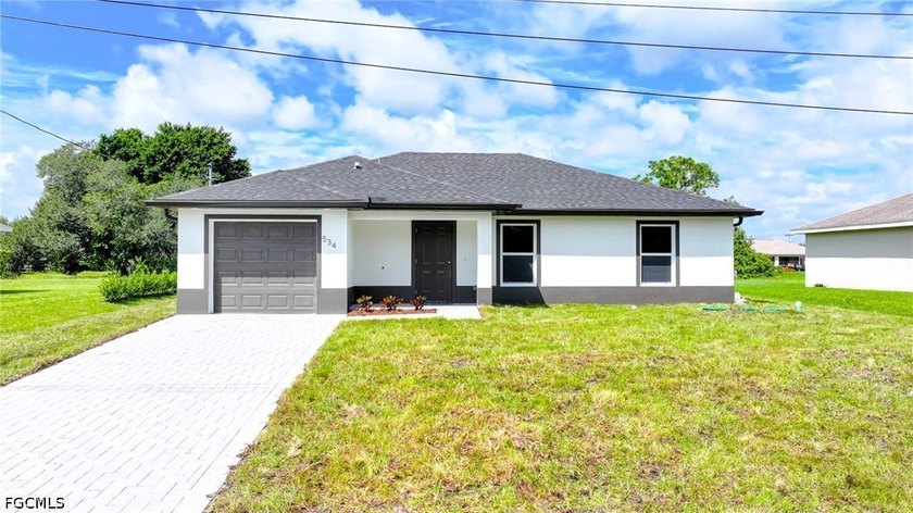 BRAND NEW CONSTRUCTION ON A FRESHWATER CANAL LOT WITH A GREAT - Beach Home for sale in Lehigh Acres, Florida on Beachhouse.com
