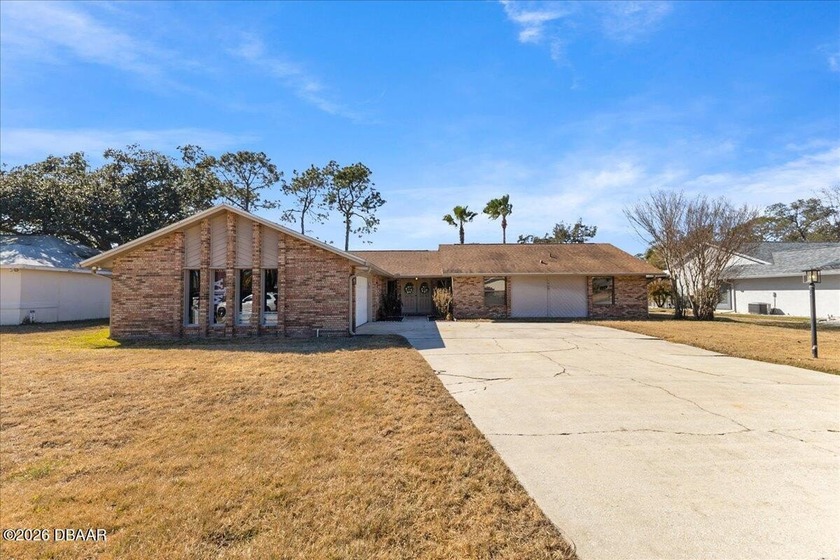 Welcome to this beautifully updated 3-bedroom, 2-bath - Beach Home for sale in Port Orange, Florida on Beachhouse.com