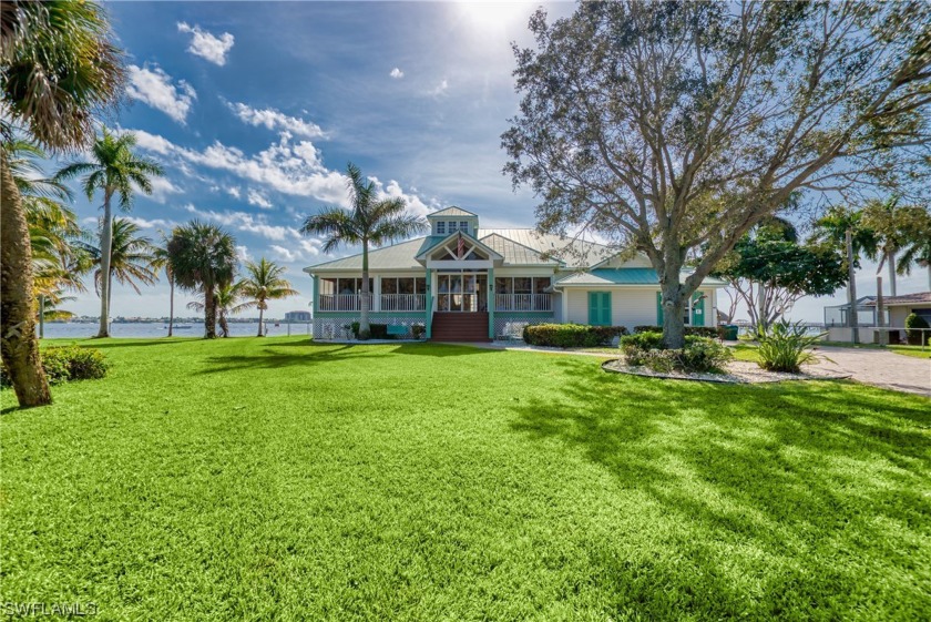 This iconic, Key West-style Villa rests majestically atop an - Beach Home for sale in Cape Coral, Florida on Beachhouse.com