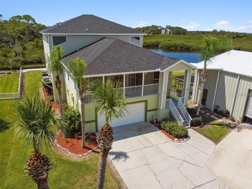 Welcome to this executive-style waterfront home offering luxury - Beach Home for sale in Port Richey, Florida on Beachhouse.com
