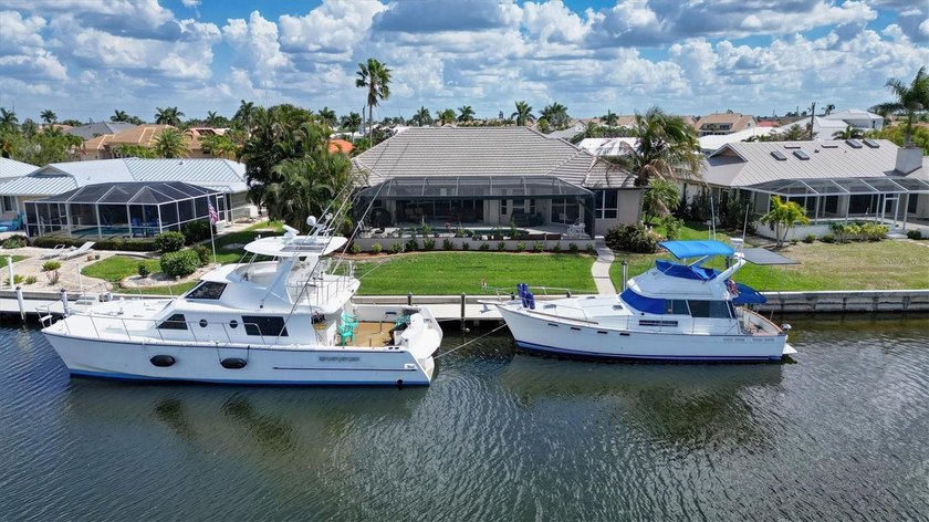 Expansive Open Water Views, 100 Ft Seawall, New Dock, PGI - Beach Home for sale in Punta Gorda, Florida on Beachhouse.com