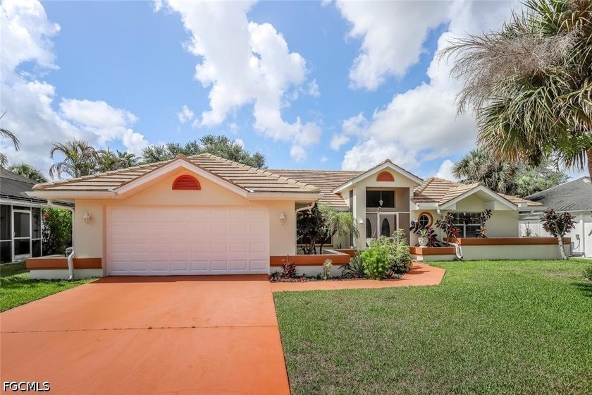 Welcome to this MOVE-IN READY, HEATED POOL home that boasts lots - Beach Home for sale in Lehigh Acres, Florida on Beachhouse.com
