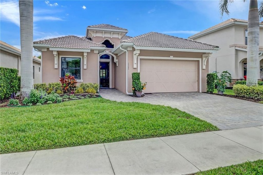 Introducing this charming single-family home situated in the - Beach Home for sale in Naples, Florida on Beachhouse.com