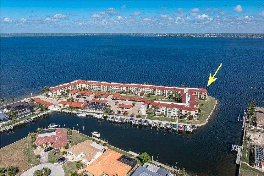 TOP-FLOOR, END-UNIT HARBORFRONT CONDO IN COLONY POINT - Enjoy - Beach Condo for sale in Punta Gorda, Florida on Beachhouse.com