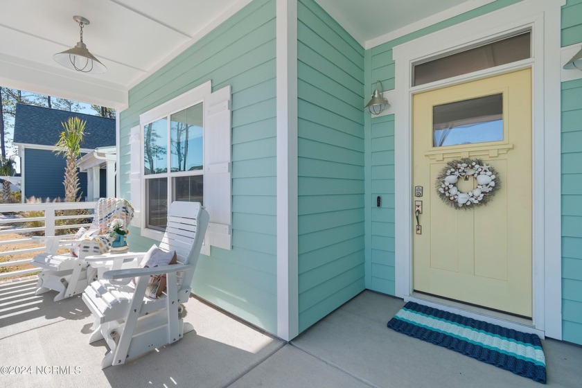 This stunning home with a fantastic setting on a large pond is - Beach Home for sale in Ocean Isle Beach, North Carolina on Beachhouse.com