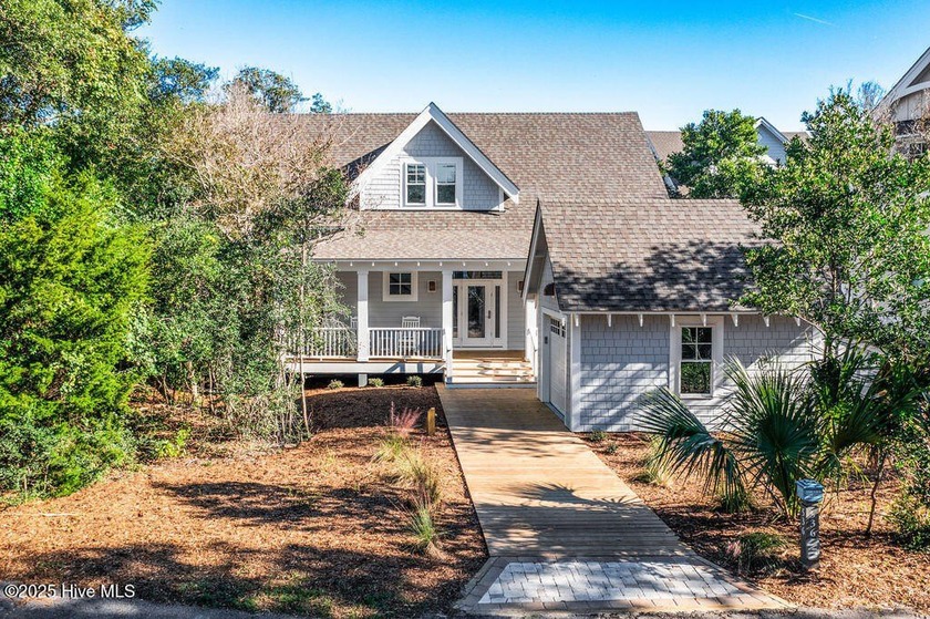 Set on a corner lot within a small cluster of just four cottages - Beach Home for sale in Bald Head Island, North Carolina on Beachhouse.com
