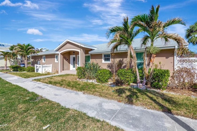 This 3-bedroom, 3-bathroom home with a 1-car garage offers an - Beach Home for sale in Clearwater Beach, Florida on Beachhouse.com