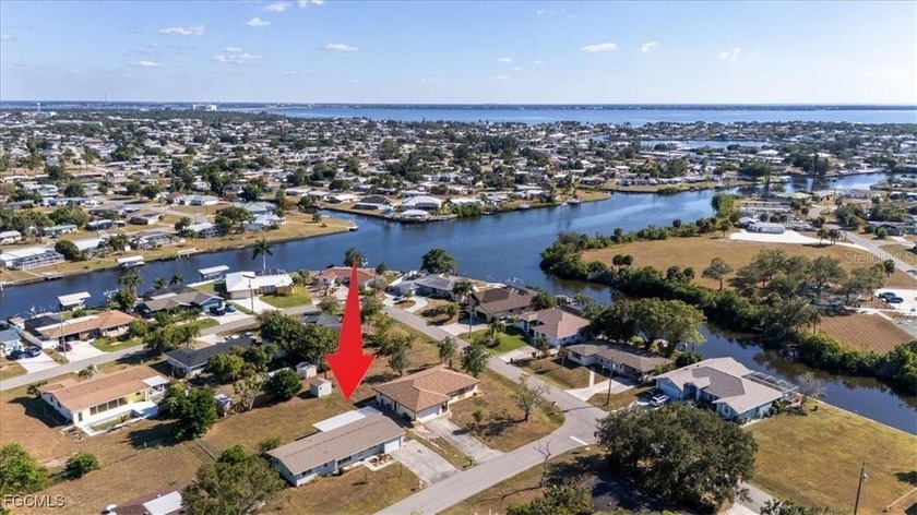Priced to Sell!! This spacious 3-bedroom, 2-bath home with a - Beach Home for sale in Port Charlotte, Florida on Beachhouse.com
