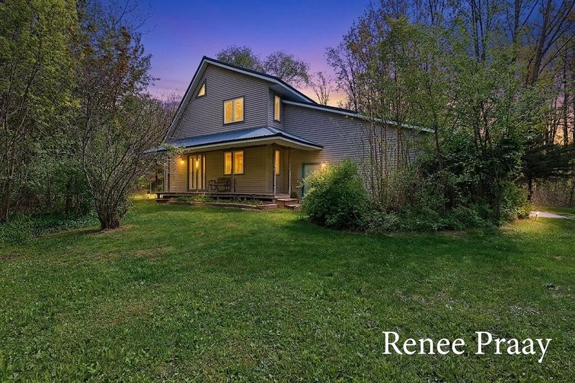 Nestled on 10.89 private wooded acres along scenic Todd Creek (a - Beach Home for sale in Whitehall, Michigan on Beachhouse.com