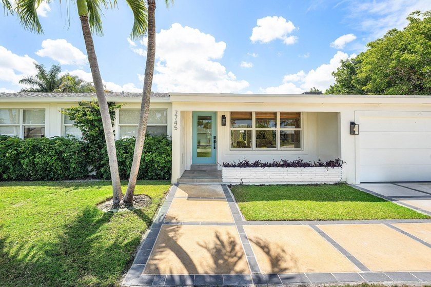 Waterfront living with direct canal access, a fully renovated - Beach Home for sale in Lake Clarke Shores, Florida on Beachhouse.com