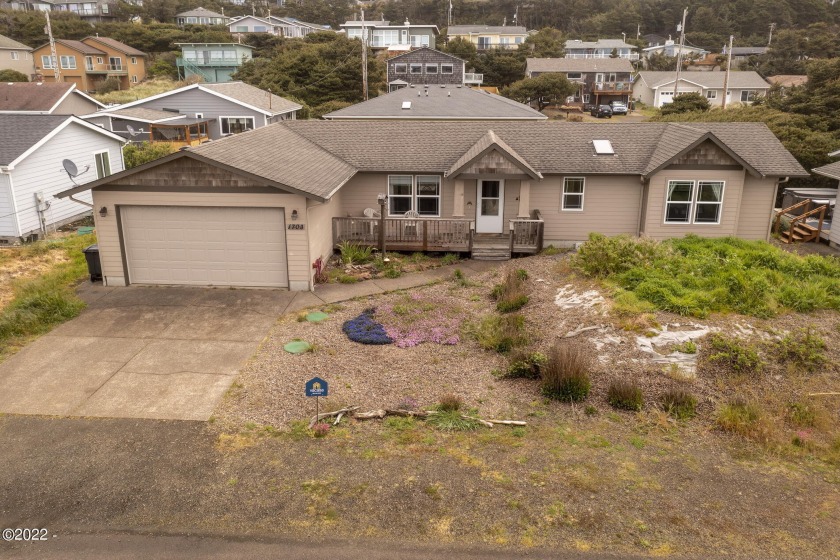 This tranquil Bayshore Beach home is located on a quaint street - Beach Home for sale in Waldport, Oregon on Beachhouse.com