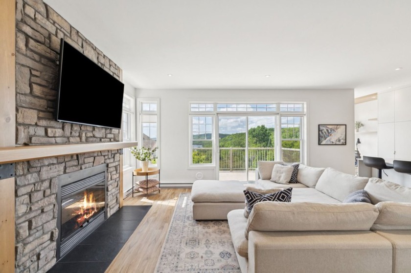 One of the most beautiful condos in Cap Tremblant overlooking - Beach Condo for sale in Mont-Tremblant,  on Beachhouse.com
