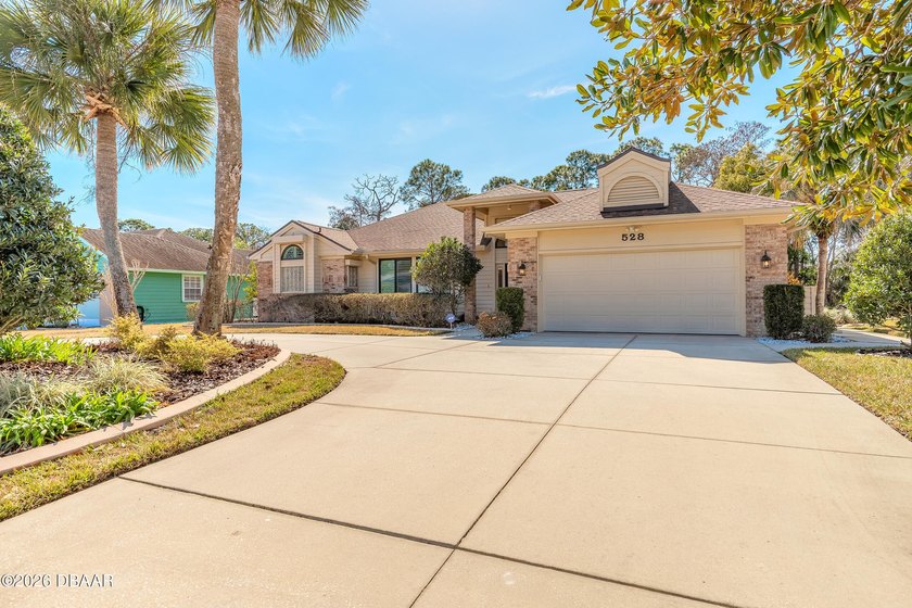 Centrally located in the gated golf community of Pelican Bay - Beach Home for sale in Daytona Beach, Florida on Beachhouse.com