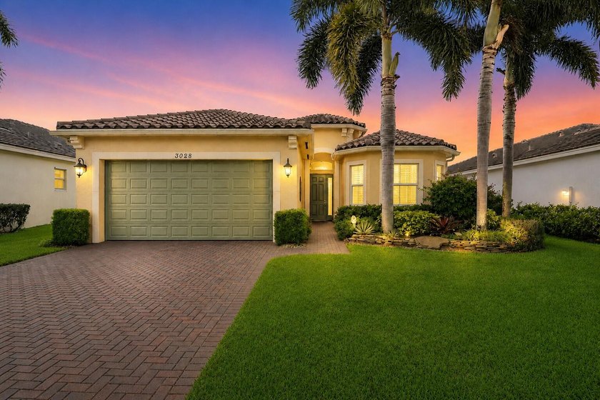 This exceptional 3-bedroom, 2-bath residence is majestically - Beach Home for sale in Royal Palm Beach, Florida on Beachhouse.com