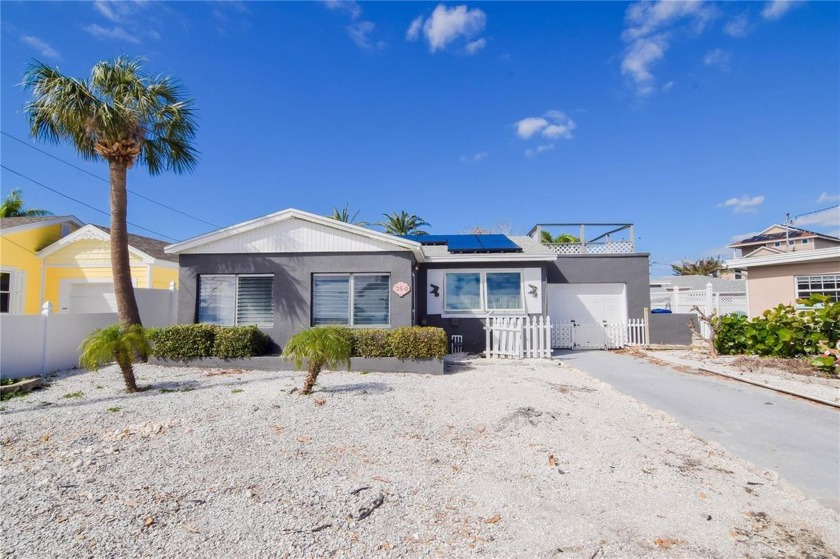 This beach-style pool home offers a rare opportunity to live - Beach Home for sale in Madeira Beach, Florida on Beachhouse.com