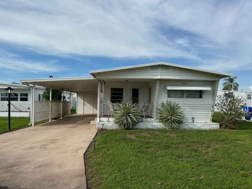 Enjoy expansive golf course views from this home that sits on - Beach Home for sale in Bradenton, Florida on Beachhouse.com