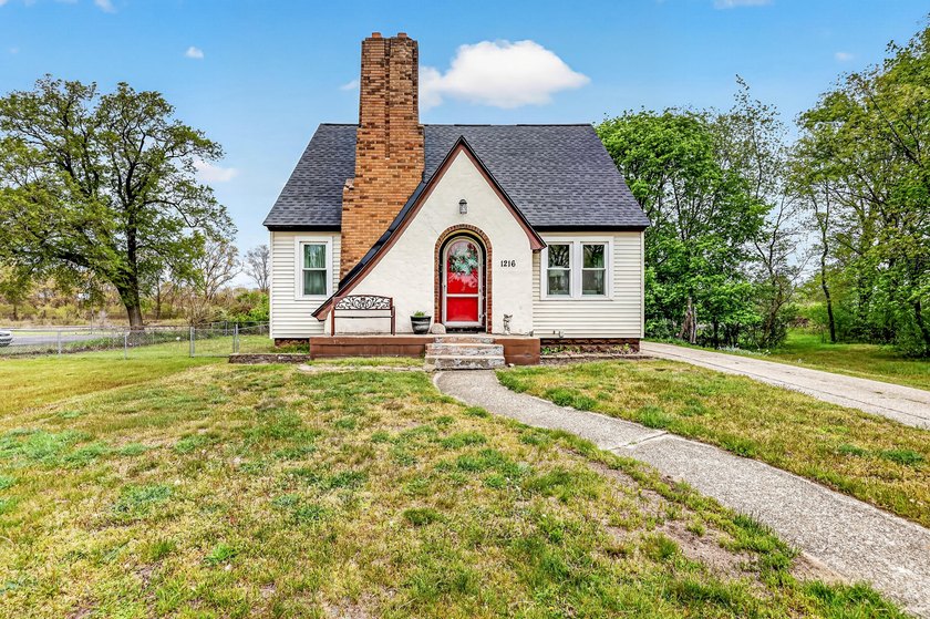 This charming two story home offers the perfect mix of character - Beach Home for sale in Muskegon, Michigan on Beachhouse.com