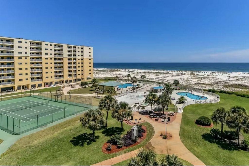Sitting pretty on the top floor, this beautifully refreshed - Beach Condo for sale in Gulf Shores, Alabama on Beachhouse.com