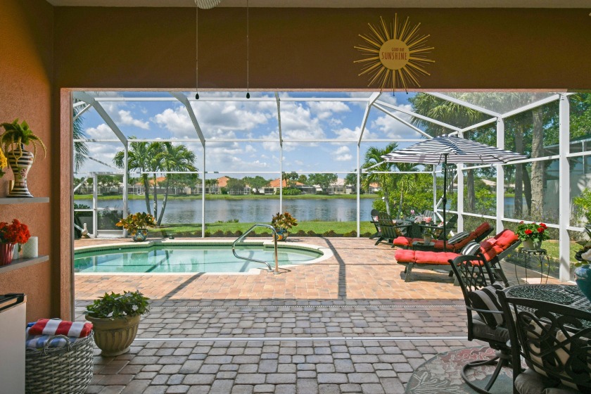 Tucked away,  In a Gated Enclave. on a quiet street, This - Beach Home for sale in Hobe Sound, Florida on Beachhouse.com