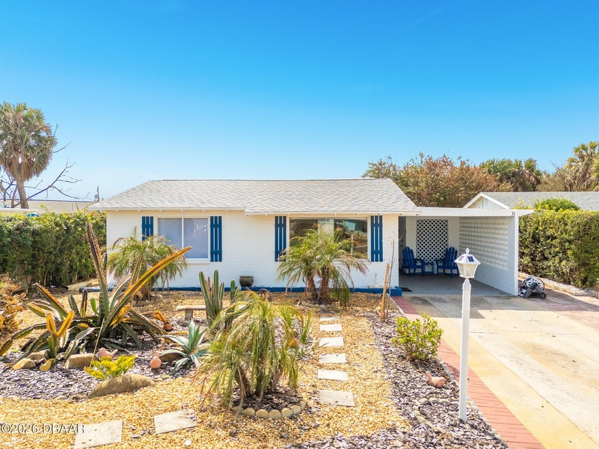Live the ultimate beachside lifestyle in this real beach-themed - Beach Home for sale in Ormond Beach, Florida on Beachhouse.com