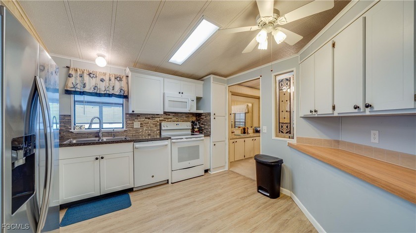 Welcome to effortless SW Florida living in this turnkey - Beach Home for sale in North Fort Myers, Florida on Beachhouse.com