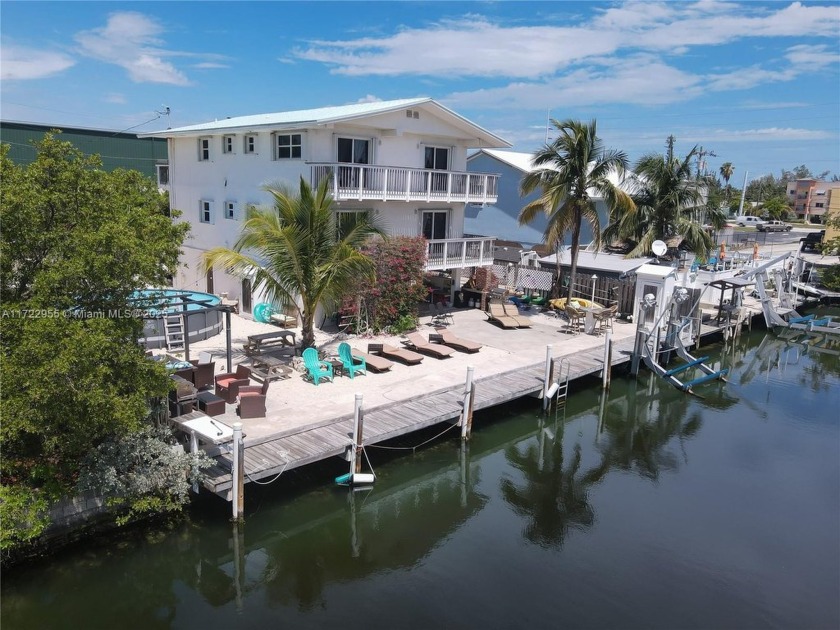 WATERFRONT DUPLEX WITH ENDLESS POSSIBILITIES | Prime Investment - Beach Home for sale in Marathon, Florida on Beachhouse.com