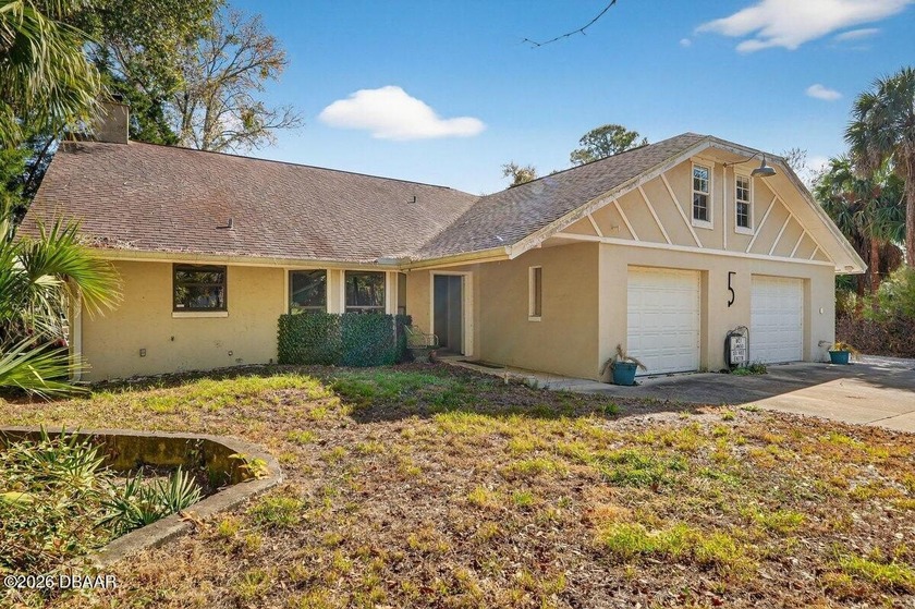 Discover the potential in this spacious multi-living property - Beach Home for sale in Ormond Beach, Florida on Beachhouse.com