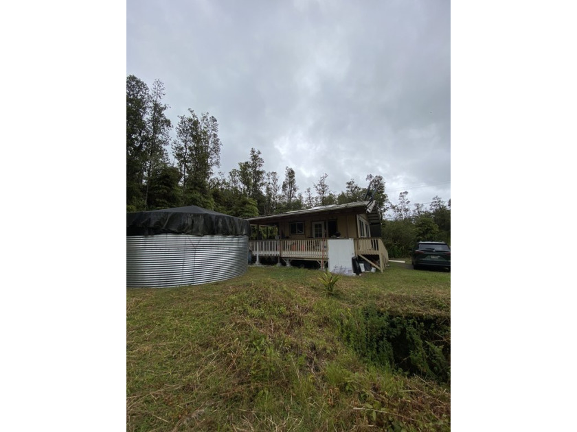 Tucked away on two wooded acres, this off-grid retreat offers - Beach Lot for sale in Mountain View, Hawaii on Beachhouse.com