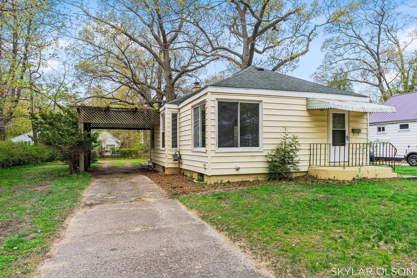 Welcome to 2153 Philo Avenue, a charming two-bedroom, one-bath - Beach Home for sale in Muskegon, Michigan on Beachhouse.com