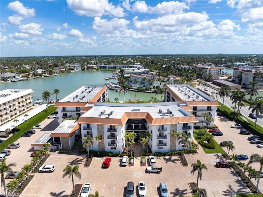Rarely available 4th-floor residence with unobstructed Moorings - Beach Home for sale in Naples, Florida on Beachhouse.com