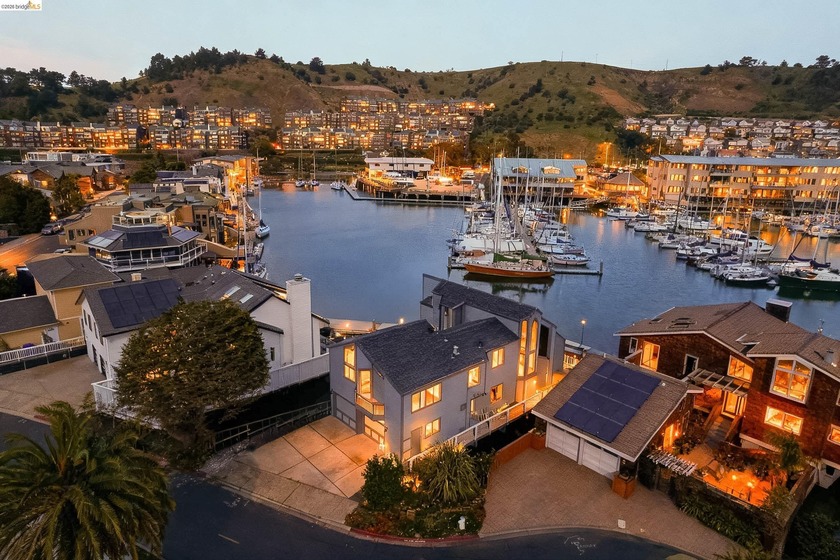 The property includes direct access to a private boat dock and a - Beach Home for sale in Richmond, California on Beachhouse.com