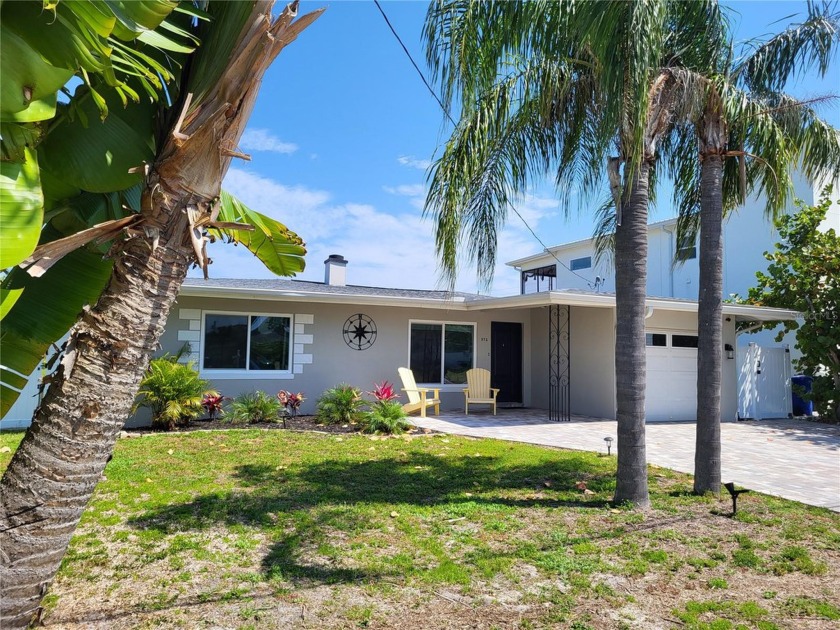 This beautifully renovated, waterfront home in Baywood Shores is - Beach Home for sale in Dunedin, Florida on Beachhouse.com