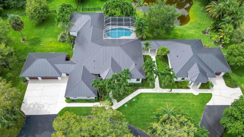 Discover this exclusive turnkey property in highly sought after - Beach Home for sale in Wellington, Florida on Beachhouse.com