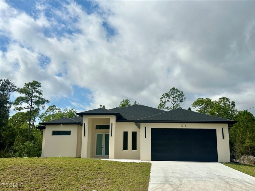 Welcome to your brand new home in Lehigh Acres, FL! This - Beach Home for sale in Lehigh Acres, Florida on Beachhouse.com